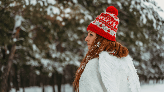 pull avec ailes d'ange dans le dos